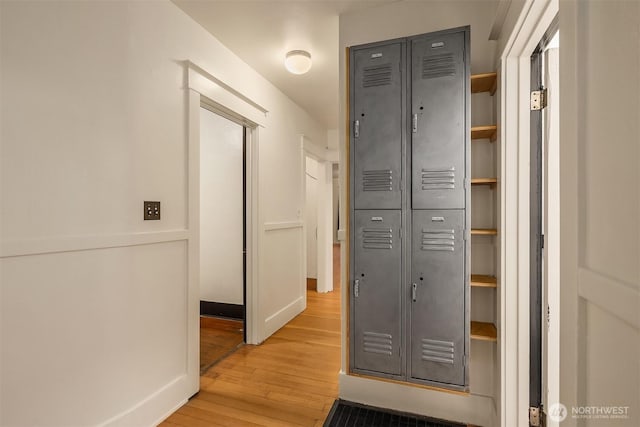 hallway with light wood finished floors