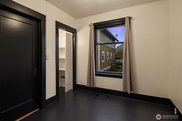 empty room with baseboards