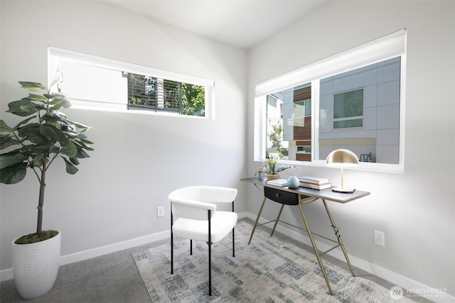 carpeted office with baseboards