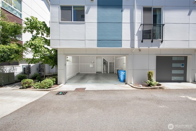 exterior space with aphalt driveway