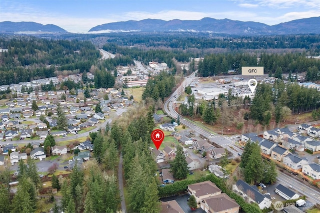 aerial view featuring a mountain view and a residential view