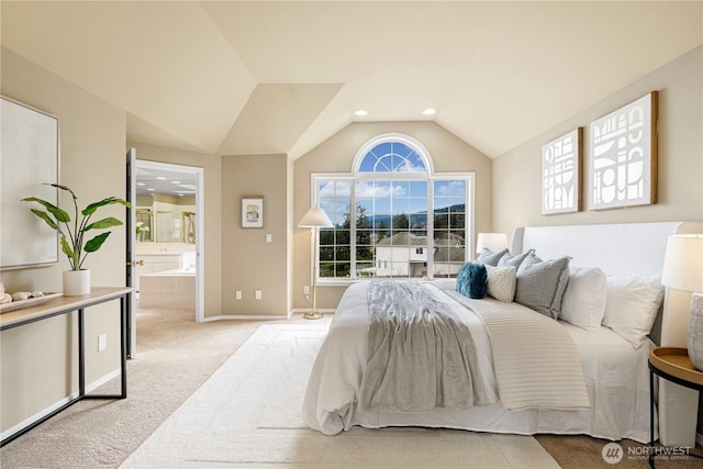 carpeted bedroom with recessed lighting, ensuite bath, baseboards, and vaulted ceiling