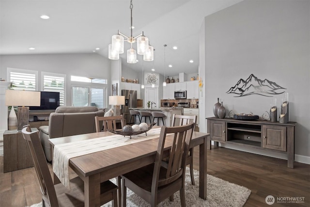 dining area with dark wood-style floors, recessed lighting, and high vaulted ceiling