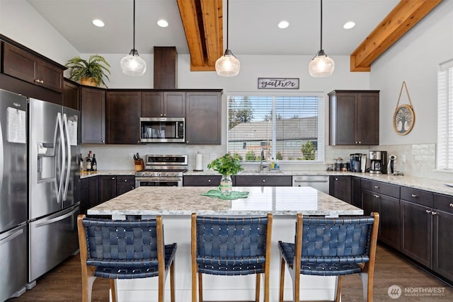 kitchen with dark brown cabinetry, tasteful backsplash, dark wood-style flooring, beamed ceiling, and stainless steel appliances