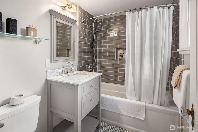 bathroom with toilet, vanity, and shower / bathtub combination with curtain