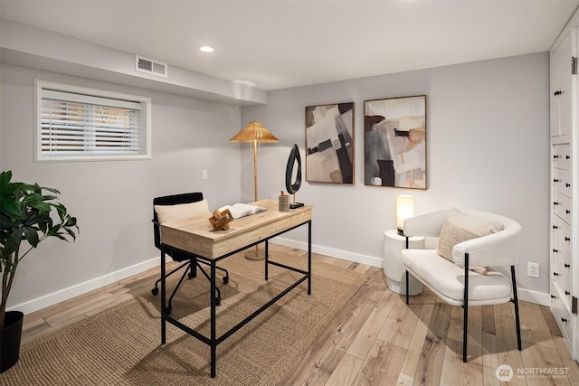 office area featuring light wood-type flooring, baseboards, visible vents, and recessed lighting