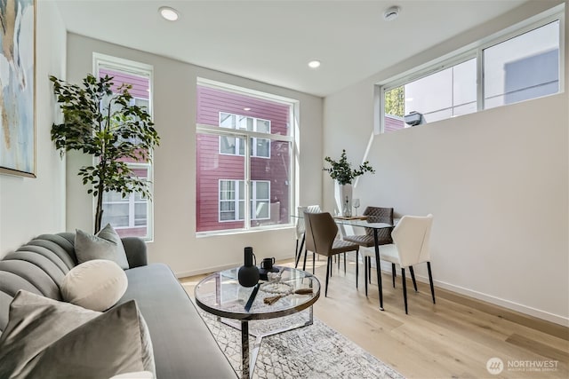 interior space with recessed lighting, light wood-style flooring, and baseboards