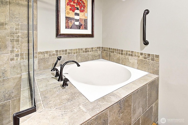 bathroom featuring a garden tub