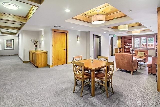 dining room with recessed lighting, light carpet, visible vents, baseboards, and a tray ceiling