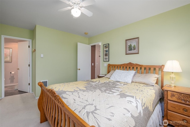 carpeted bedroom with a ceiling fan