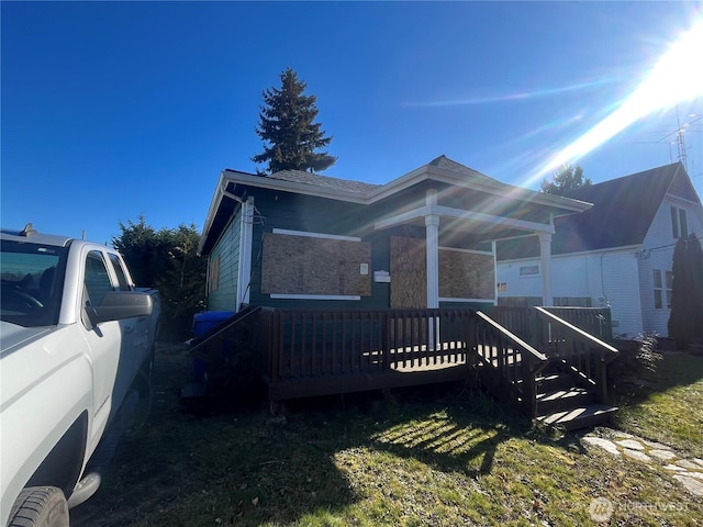 view of home's exterior featuring fence