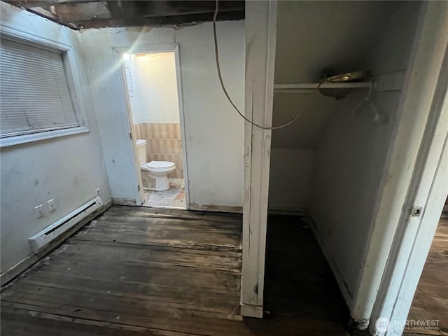 bathroom featuring toilet and a baseboard radiator