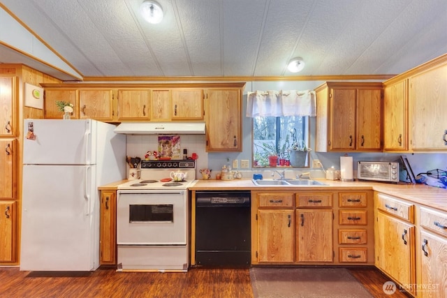 kitchen featuring dark wood-style floors, white appliances, a sink, and under cabinet range hood