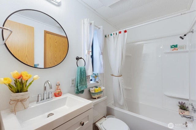 full bath featuring shower / bath combo, vanity, and toilet