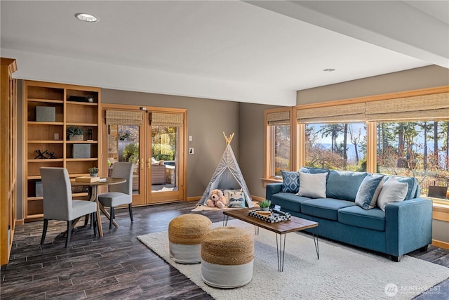 living room featuring recessed lighting, french doors, dark wood finished floors, and baseboards