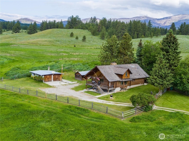 aerial view featuring a rural view and a mountain view