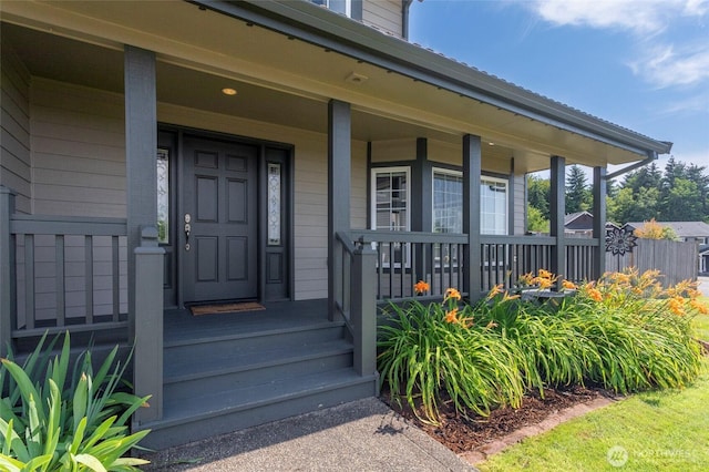 entrance to property with covered porch