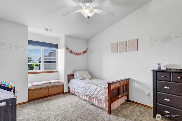 bedroom featuring ceiling fan, carpet floors, visible vents, and baseboards