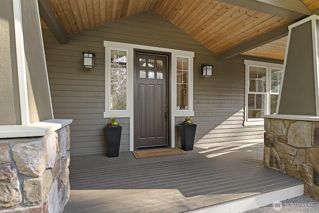 doorway to property featuring a porch