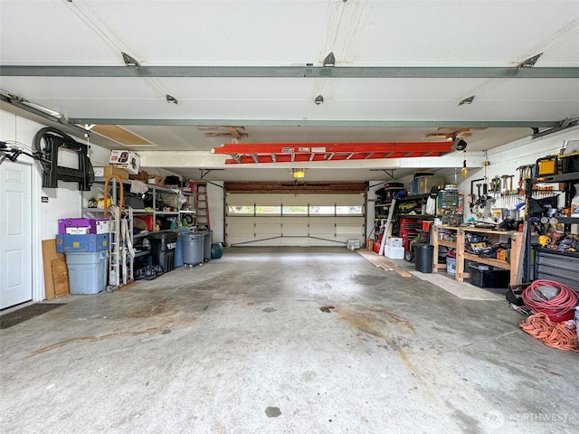 garage with a workshop area