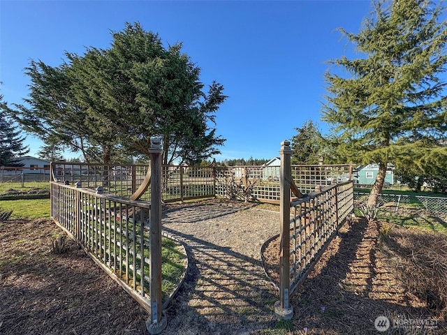 view of yard with fence