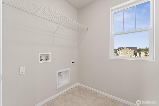 laundry room with washer hookup, laundry area, electric dryer hookup, and baseboards