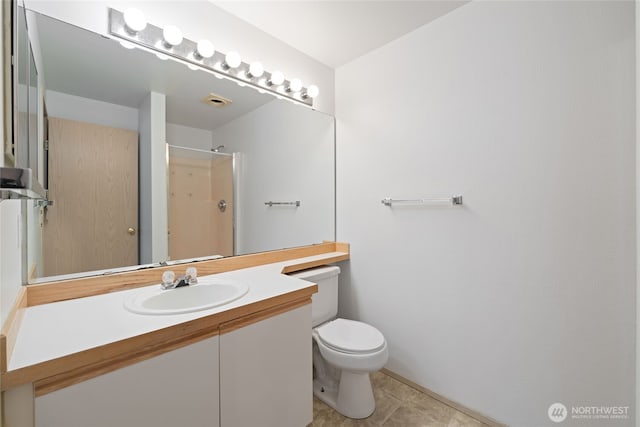 full bathroom featuring a shower, tile patterned flooring, vanity, and toilet