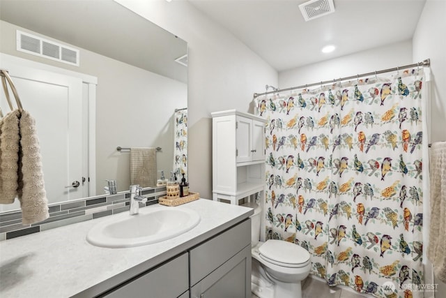 full bath with toilet, visible vents, and vanity