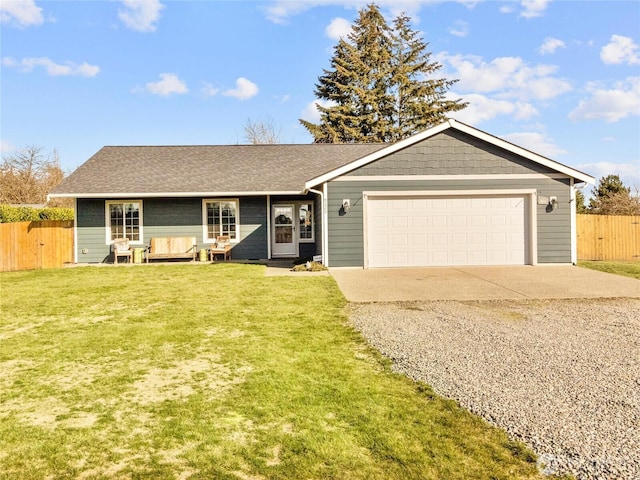 ranch-style house with a garage, fence, a front lawn, and concrete driveway