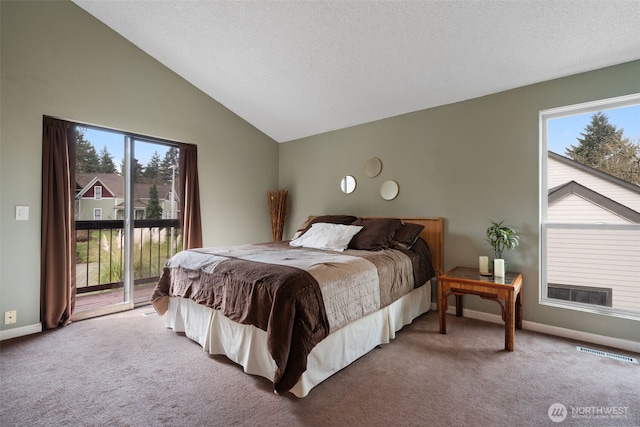 bedroom featuring vaulted ceiling, carpet, visible vents, and access to exterior