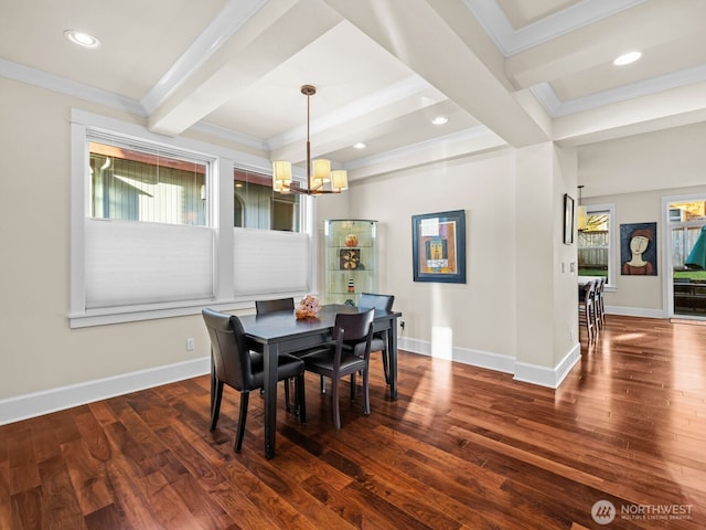 dining room with beamed ceiling, wood finished floors, and baseboards