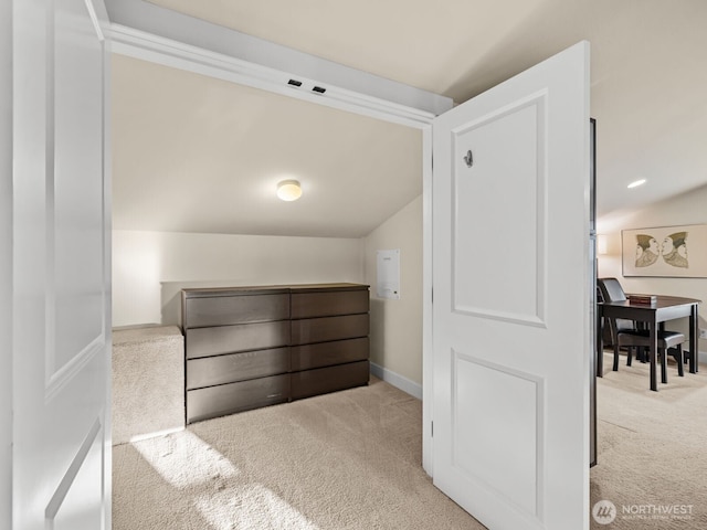 bonus room with lofted ceiling, carpet floors, and baseboards