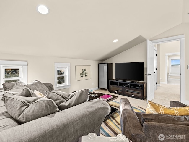 living room featuring lofted ceiling, light carpet, baseboards, and recessed lighting