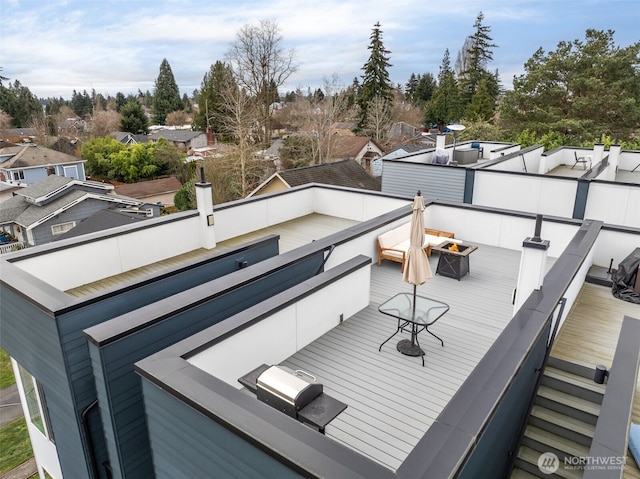 deck with a fire pit