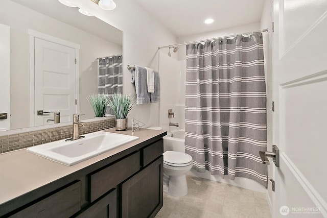 full bathroom with toilet, shower / bath combo with shower curtain, backsplash, and vanity