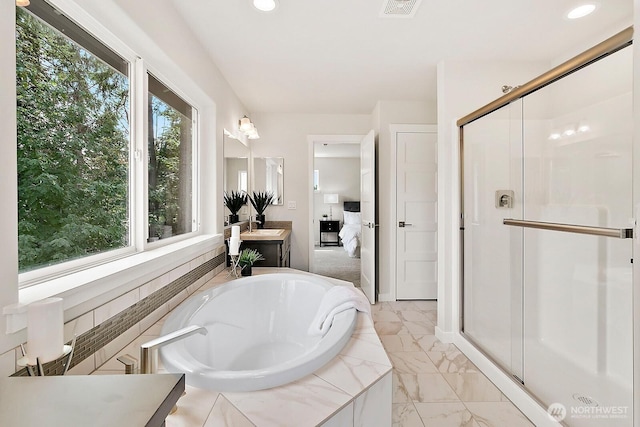 bathroom featuring visible vents, vanity, marble finish floor, a shower stall, and a bath