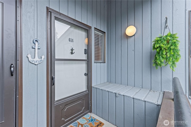 property entrance with board and batten siding