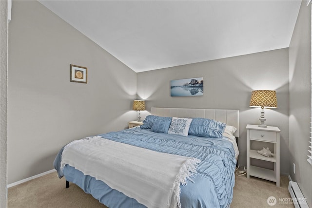 bedroom featuring vaulted ceiling, carpet floors, a baseboard radiator, and baseboards