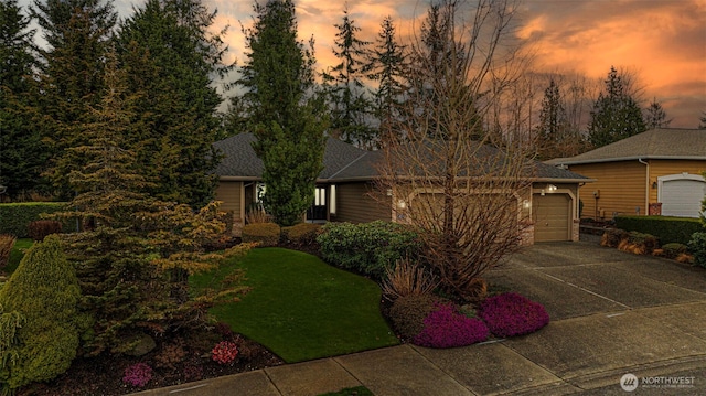 view of front of home with an attached garage and driveway