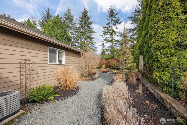 view of yard featuring central AC