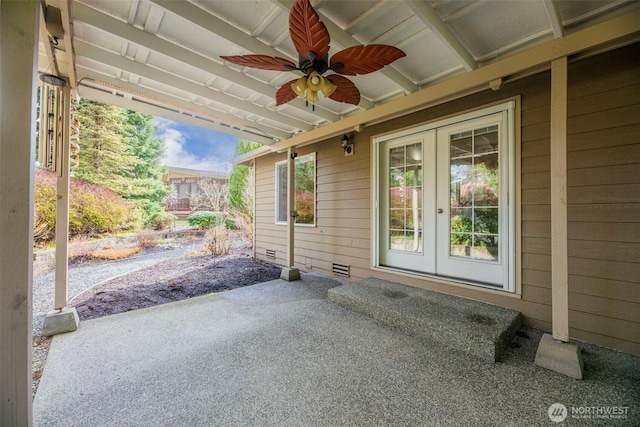 view of patio with french doors and ceiling fan