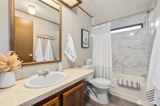 bathroom with toilet, shower / bathtub combination with curtain, wood finished floors, and vanity