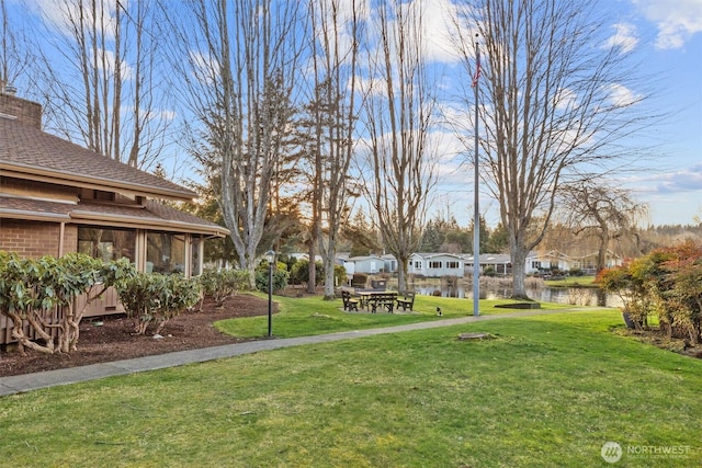 view of yard featuring a residential view