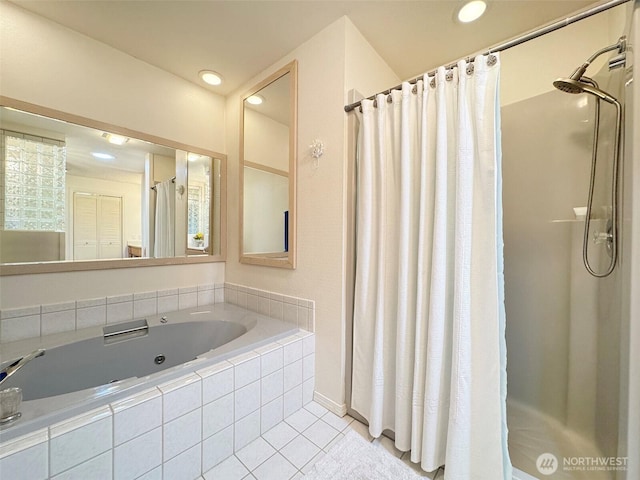 full bathroom featuring tile patterned flooring, a bath, and recessed lighting