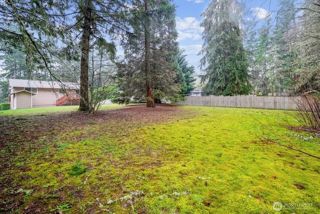 view of yard with fence