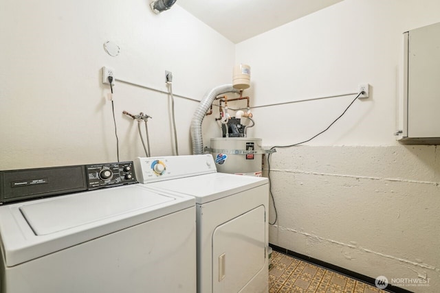 laundry area featuring washer and dryer, laundry area, and tile patterned floors