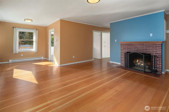 unfurnished living room with a baseboard radiator, a fireplace, ornamental molding, and wood finished floors