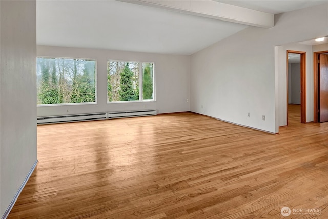 unfurnished room featuring a baseboard heating unit, wood finished floors, and vaulted ceiling with beams