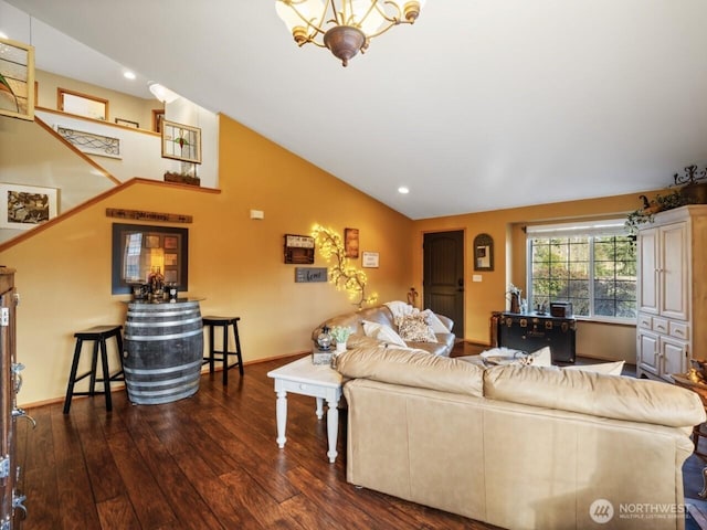 living area with baseboards, a chandelier, lofted ceiling, hardwood / wood-style floors, and recessed lighting