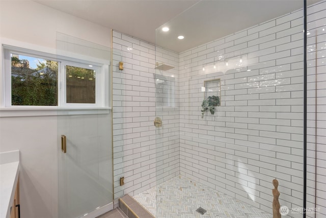 full bath with a shower stall and recessed lighting